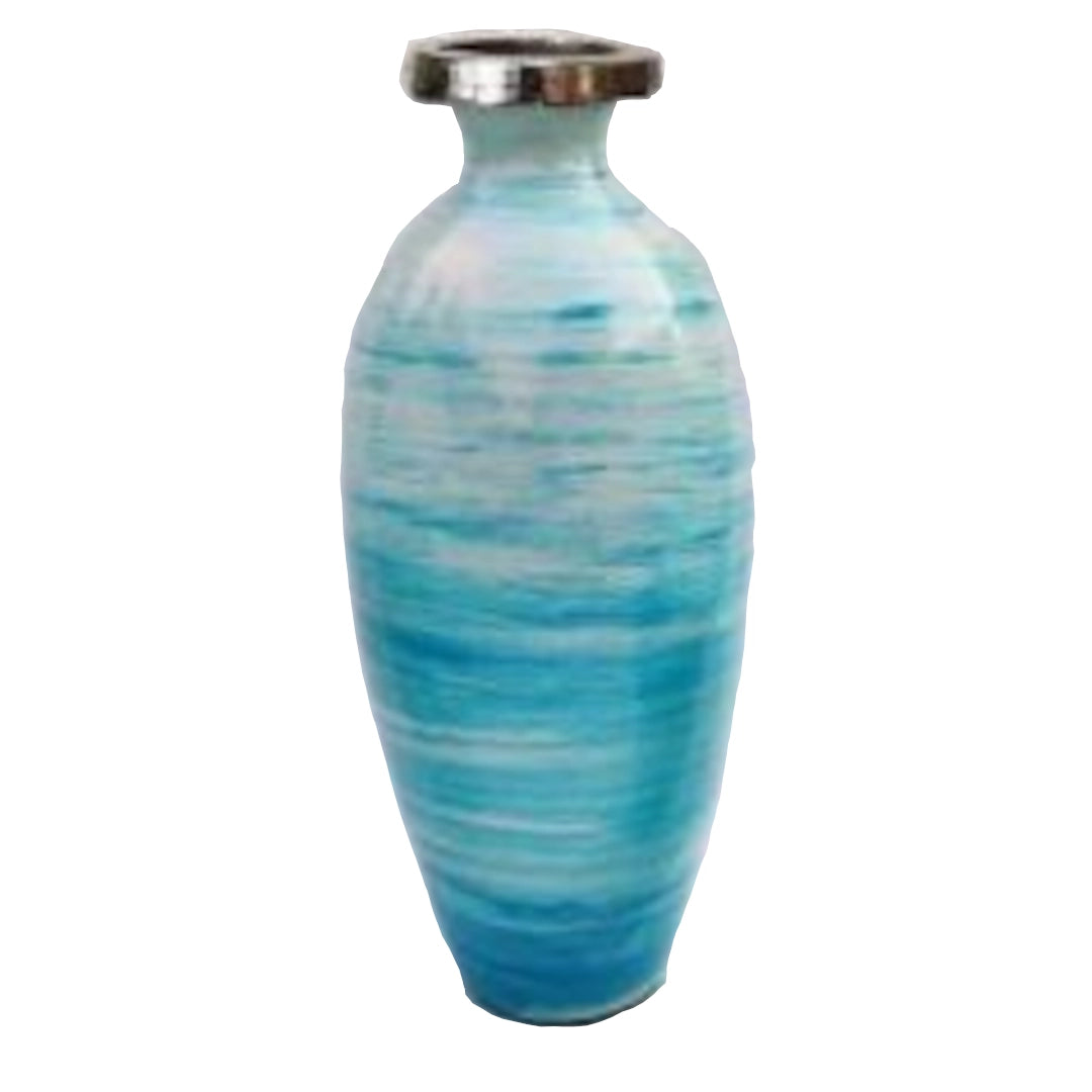 Blue ceramic vase with a ribbed texture on a white background