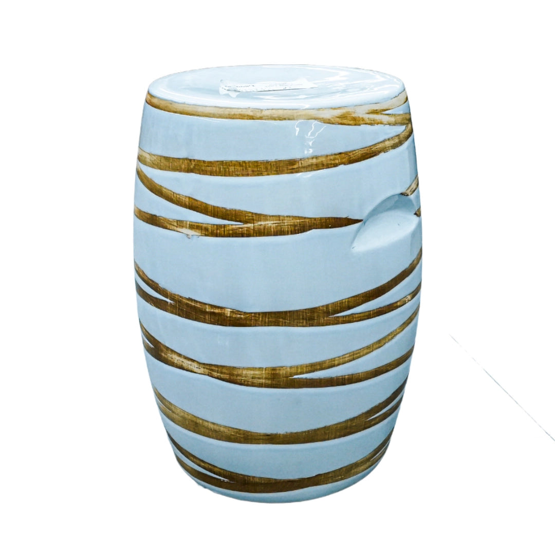 Cylindrical ceramic side table with gold stripes on a white background
