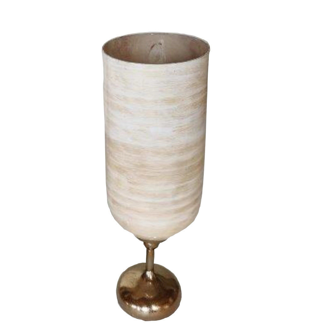 Decorative vase with ribbed design and metallic base on a white background