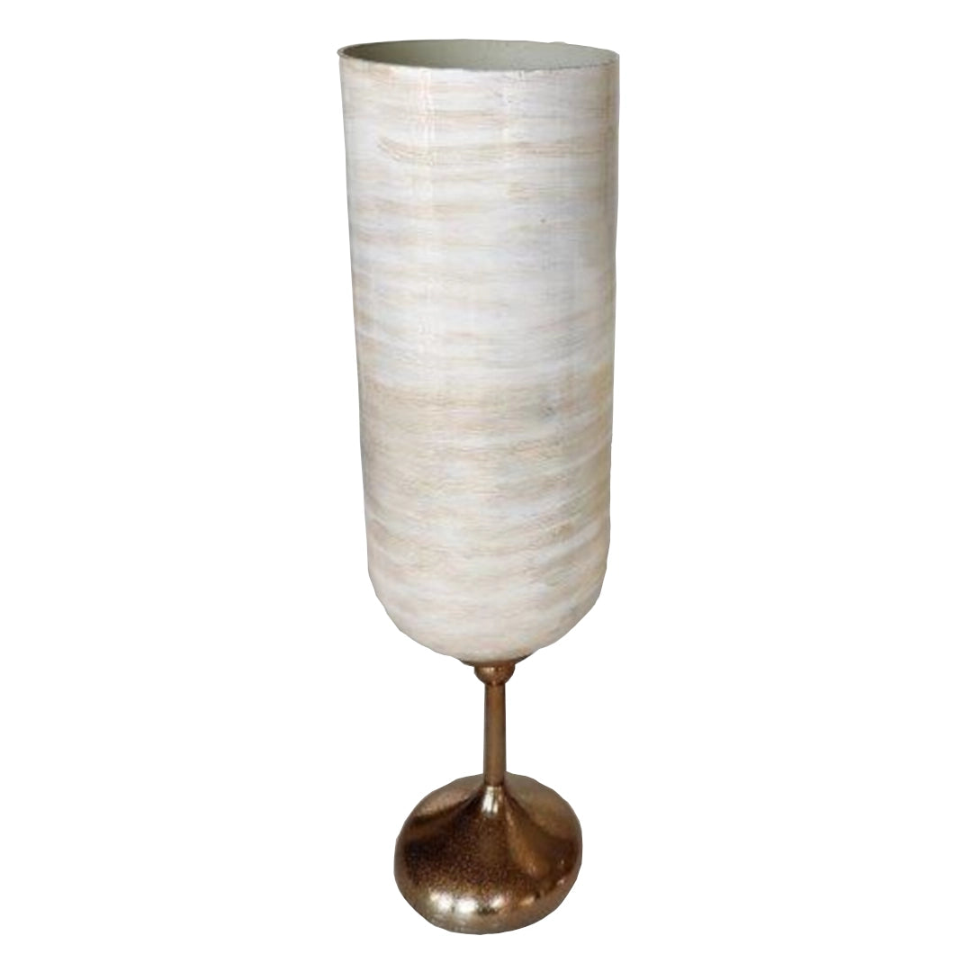 Tall cylindrical vase with textured white body and bronze base on a white background
