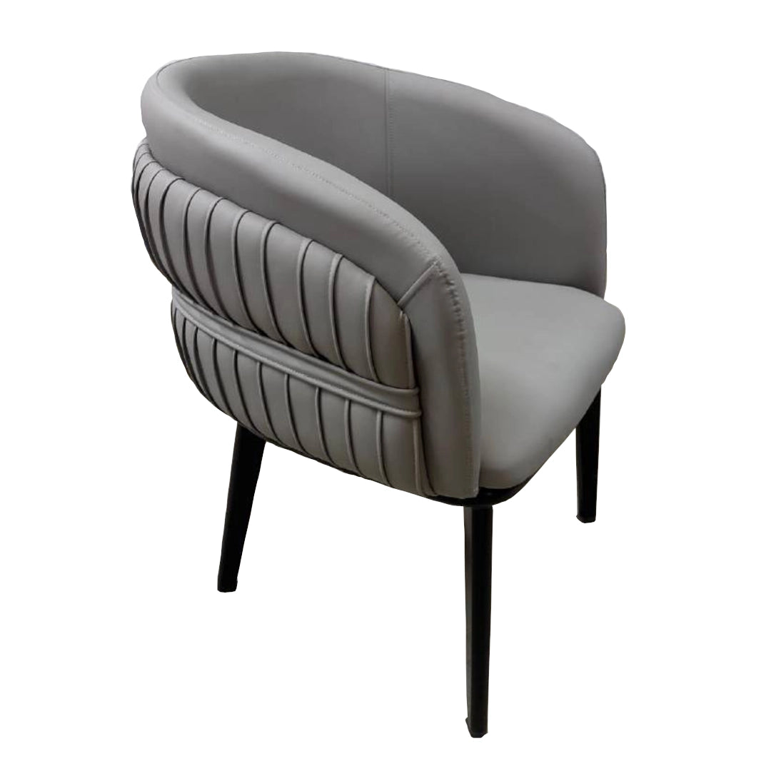 Gray armchair with ribbed backrest on a white background