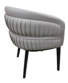 Gray upholstered chair with black legs on a white background