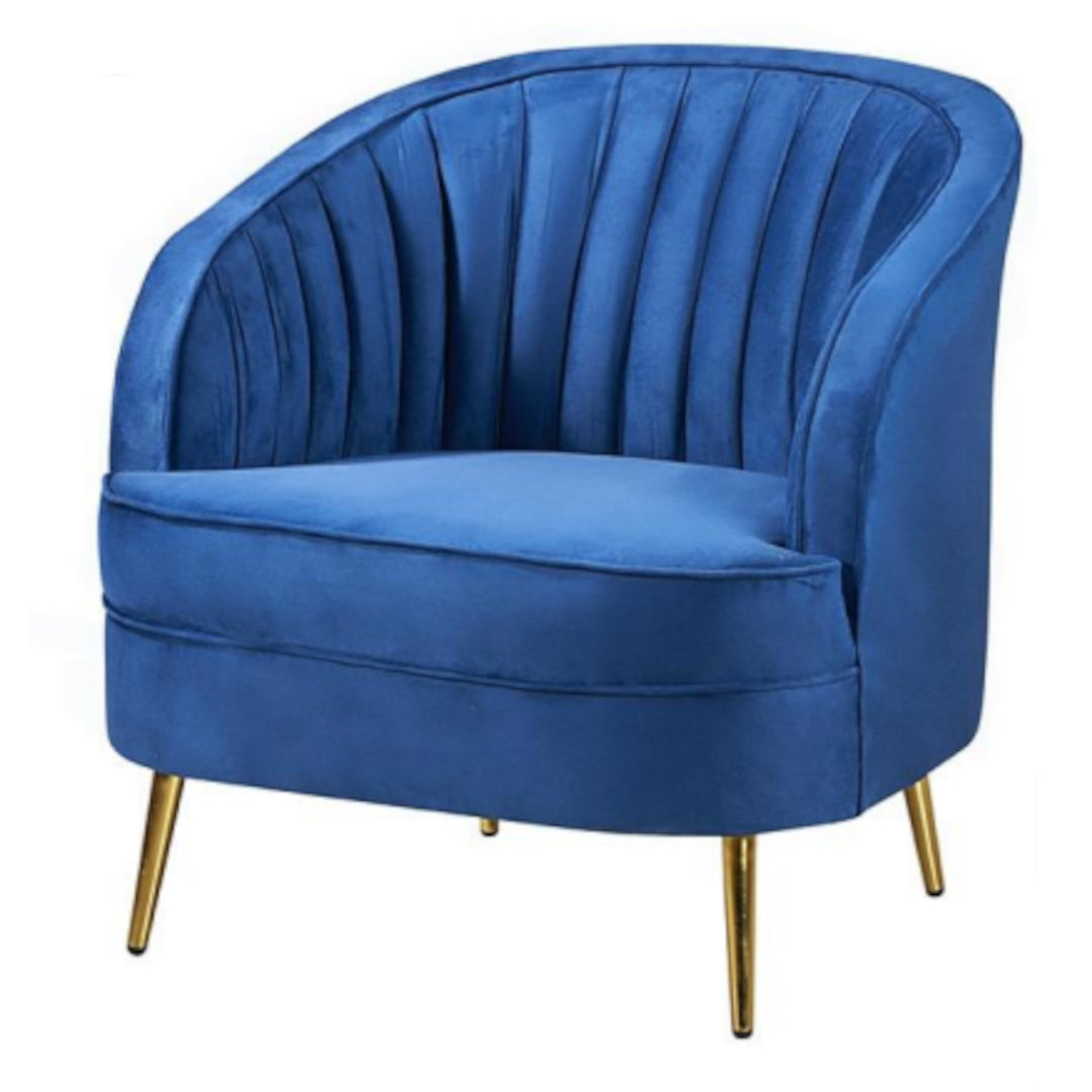 Blue velvet armchair with gold legs on a white background