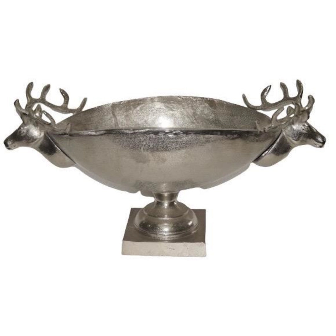 Decorative metal bowl with deer heads on a white background