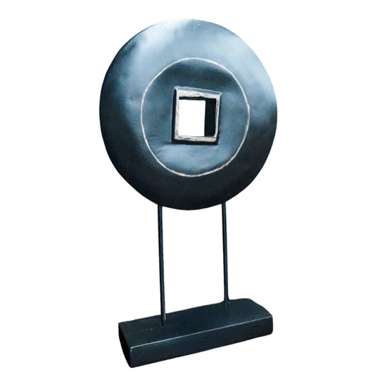 Decorative object with circular design and square center on a white background