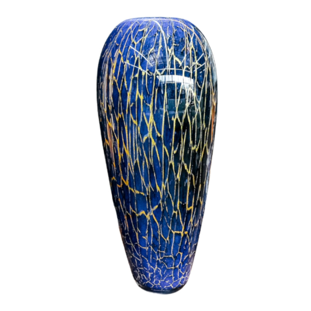 Blue and gold cracked patterned vase on a white background