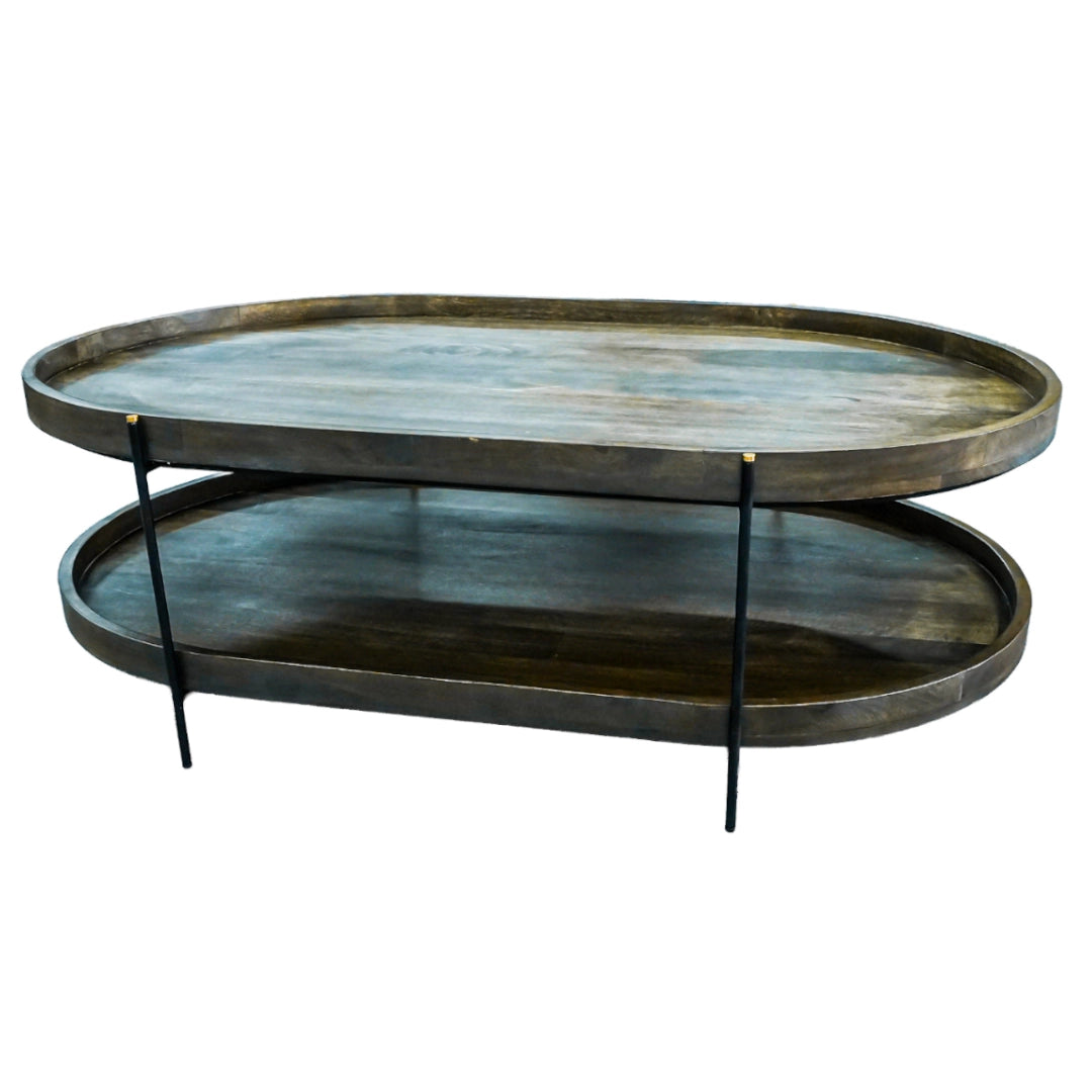 Two-tiered metal coffee table with a rustic finish on a white background