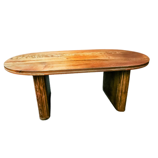 Wooden coffee table with a natural finish on a white background
