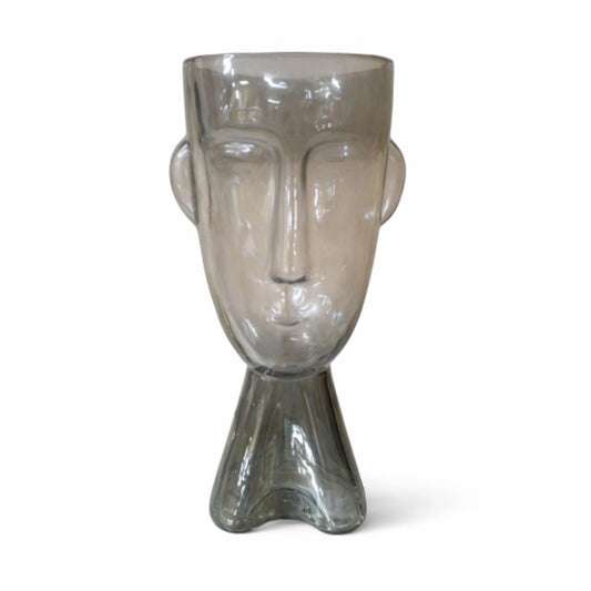 A face shaped vase on a white background