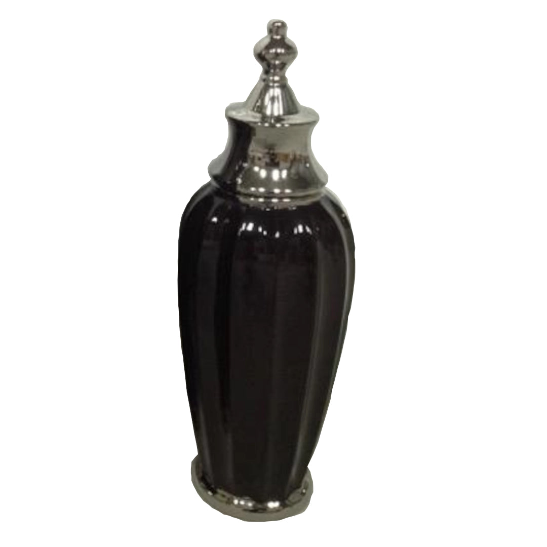 Black jar with silver base and lid on a white background