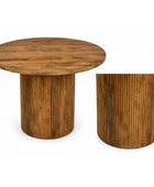 A Round wooden dining table on a white background
