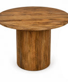A Round wooden dining table on a white background