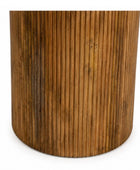 A Round wooden dining table on a white background