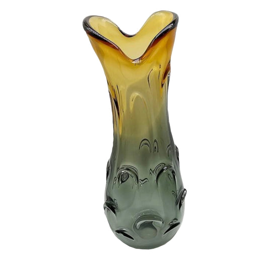 Glass vase with a gradient color from yellow to green on a white background