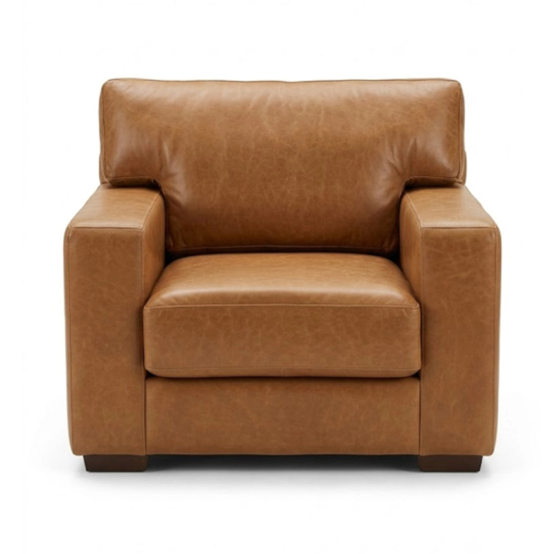 Brown leather armchair on a white background