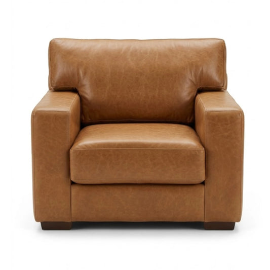 Brown leather armchair on a white background