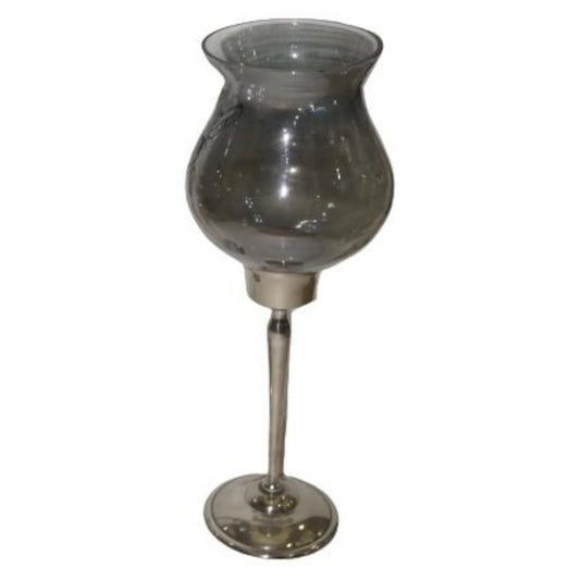 Decorative ornament with a glass shade and metal base on a white background