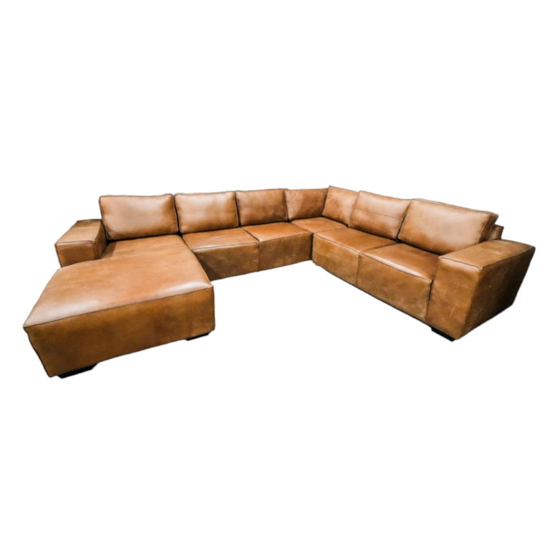 Brown leather sectional sofa on a white background