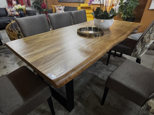 Dining table with chairs in a room setting