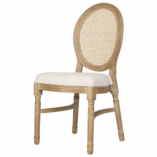 A wooden dining chair with a rattan back on a white background
