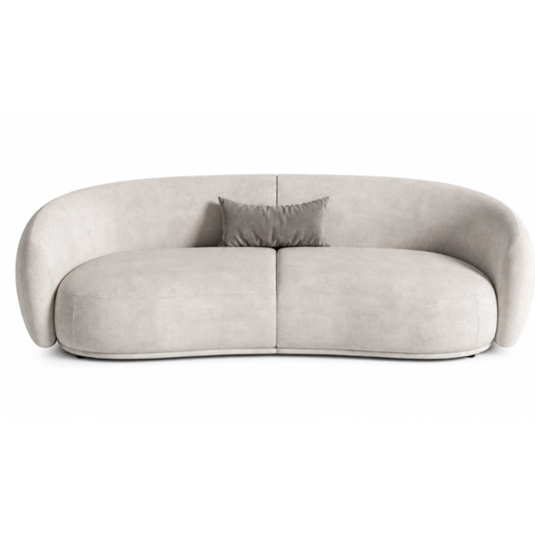 A rounded sofa in white fabric on a white background