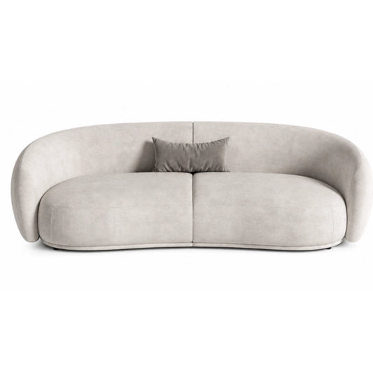 A rounded sofa in white fabric on a white background