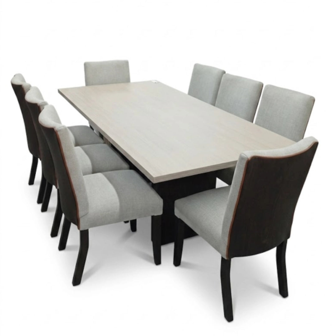 A light grey dining room set on a white background