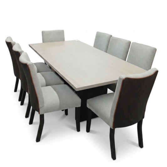 A light grey dining room set on a white background