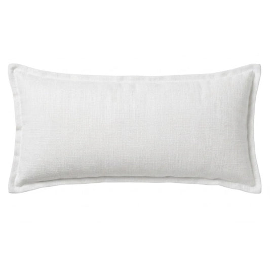 A white scatter cushion on a white background