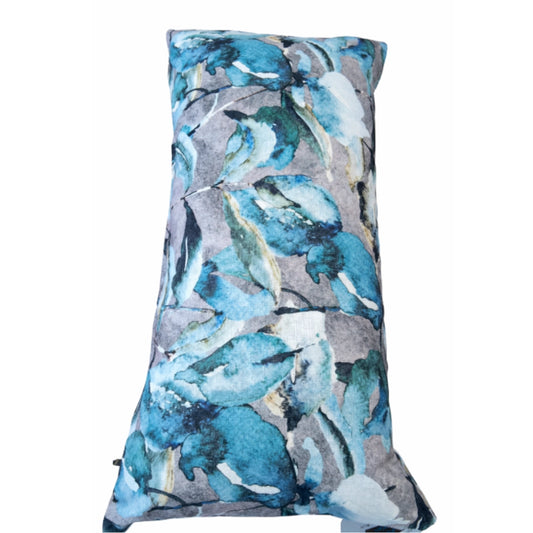 A blue leaf patterned scatter cushion on a white background