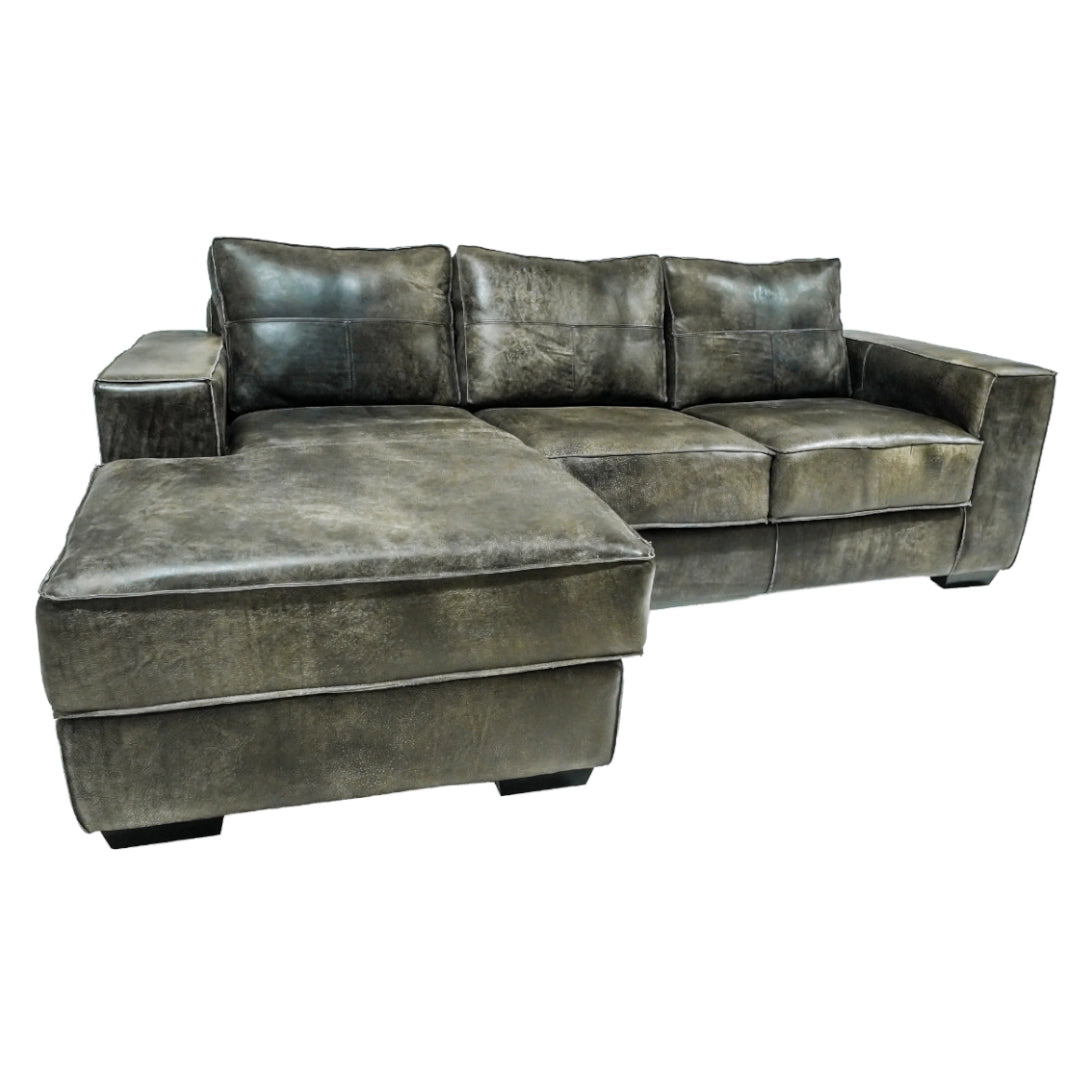 Grey leather sectional sofa on a white background