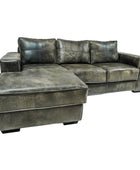 Grey leather sectional sofa on a white background