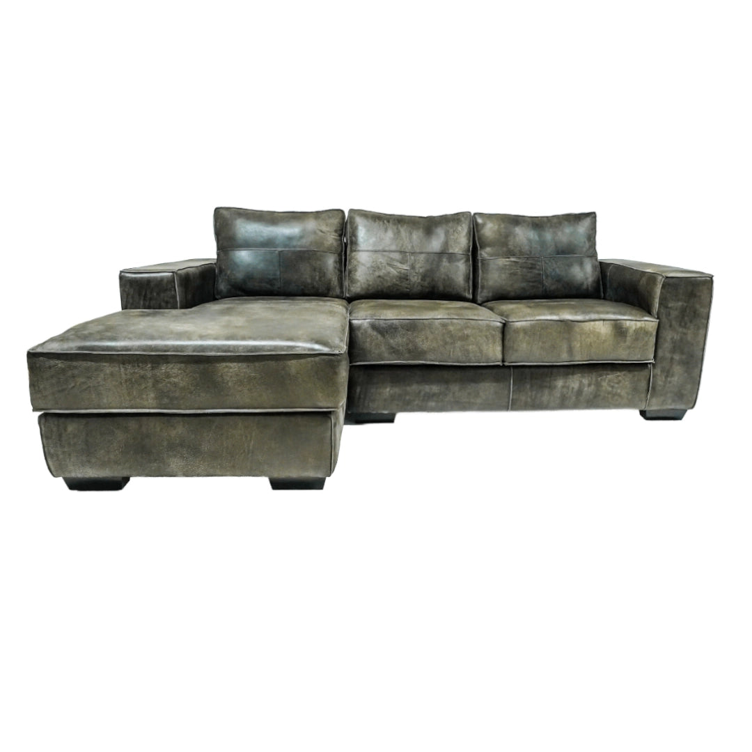 Grey leather sectional sofa on a white background