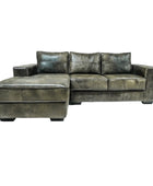 Grey leather sectional sofa on a white background