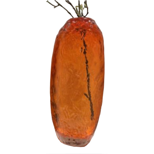 Orange glass vase with textured surface on a white background