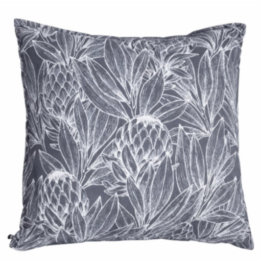 A dark grey leaf patterned scatter cushion on a white background