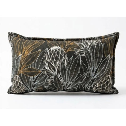 A black leaf patterned scatter cushion on a white background