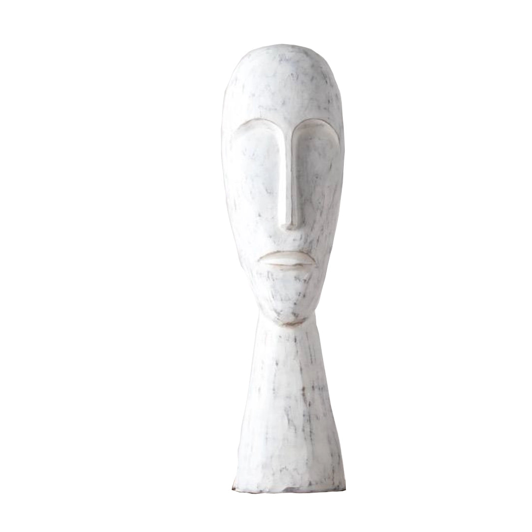 A Polyresin decorative ornament depicting a face on a white background