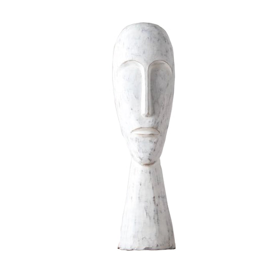 A Polyresin decorative ornament depicting a face on a white background