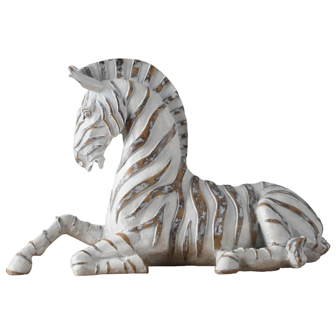 Decorative zebra figurine with white and brown stripes on a white background
