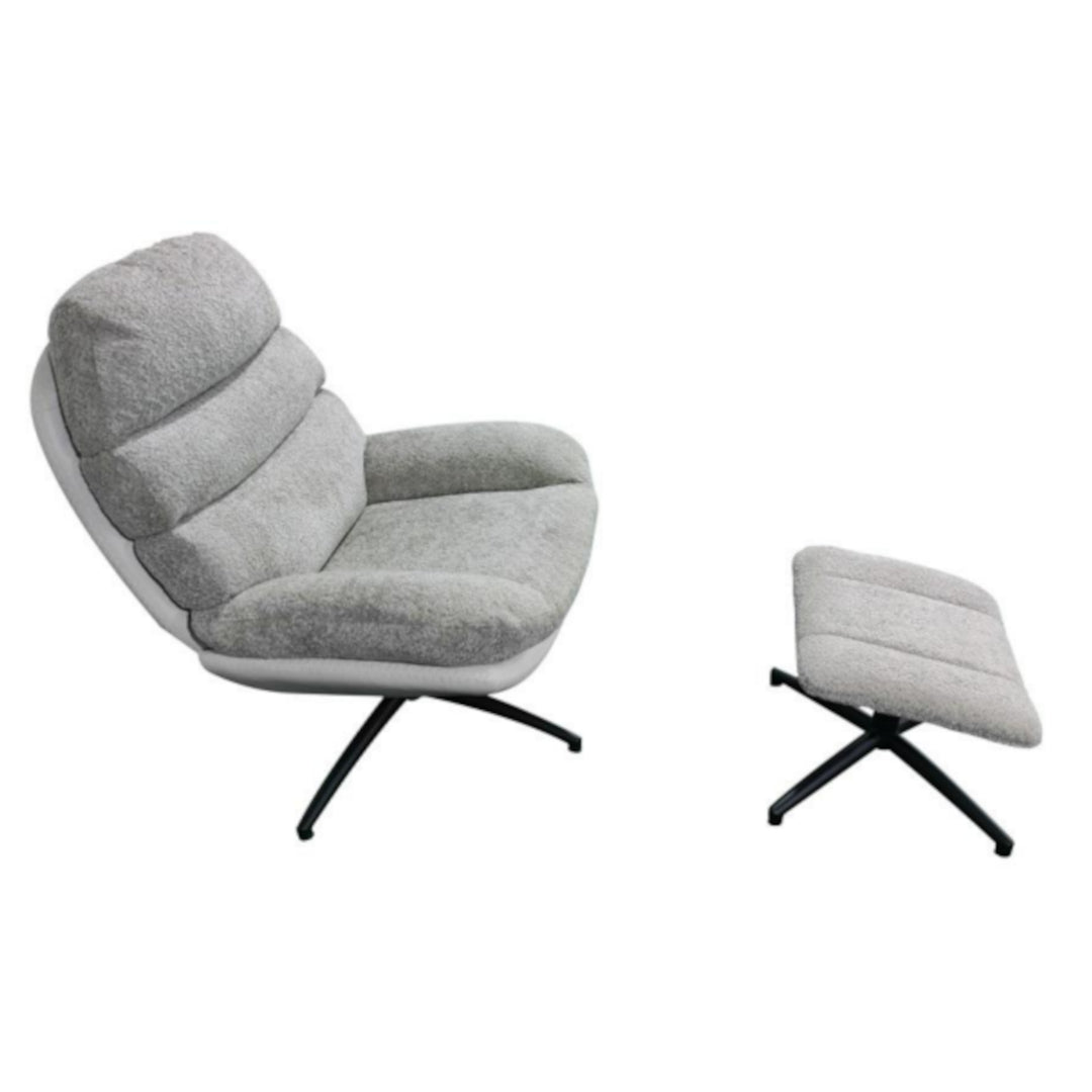 Grey lounge chair with ottoman on a white background