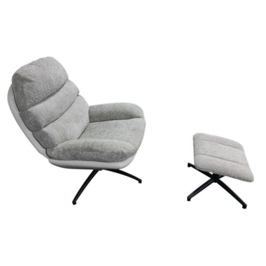 Grey lounge chair with ottoman on a white background