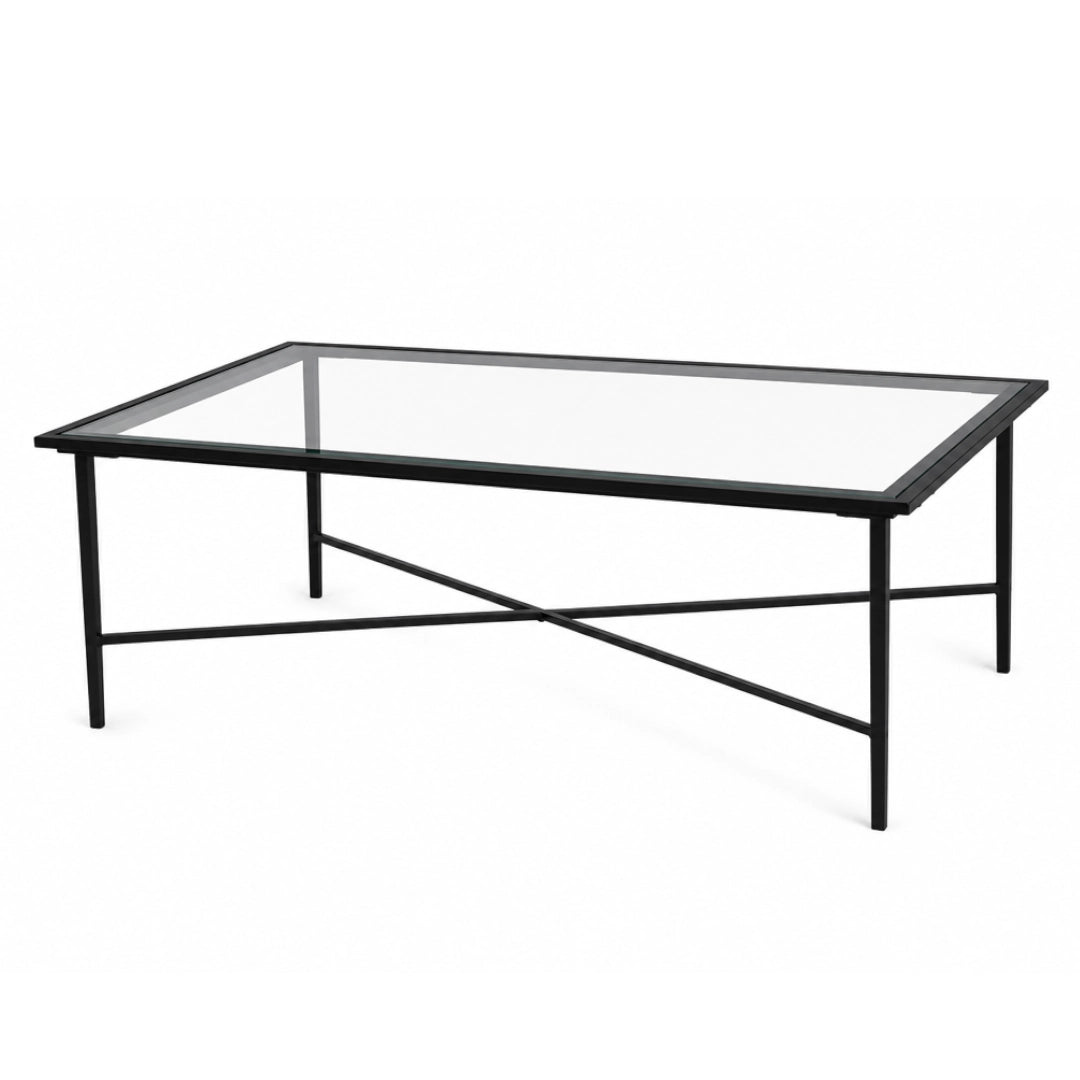 A metal and glass coffee table on a white background