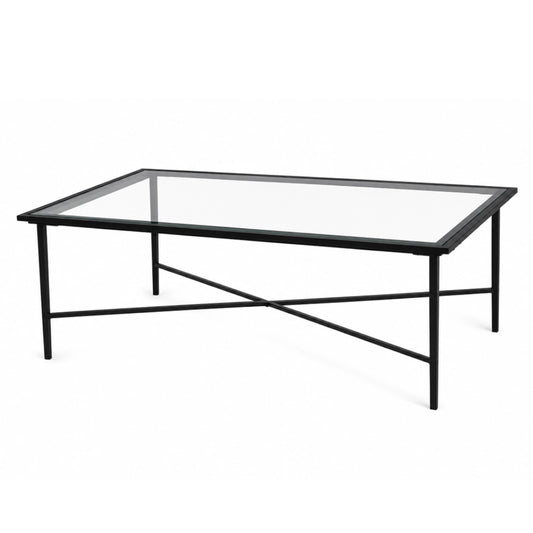 A metal and glass coffee table on a white background