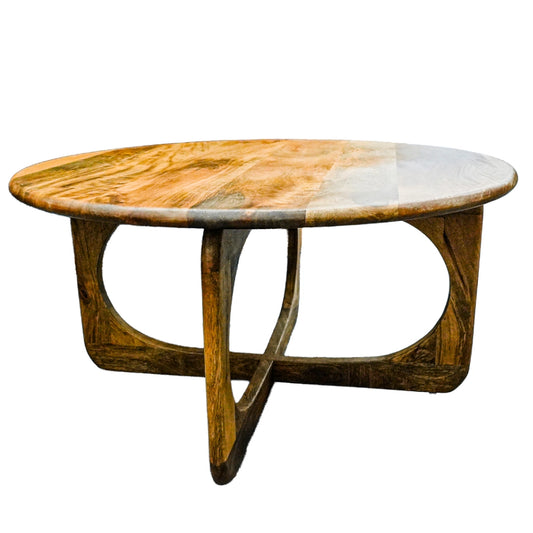Round wooden coffee table with a unique design on a white background