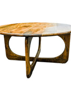 Round wooden coffee table with a unique design on a white background