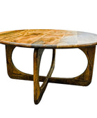 Round wooden table with a unique design on a white background