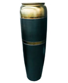 Tall black vase with gold accents on a white background