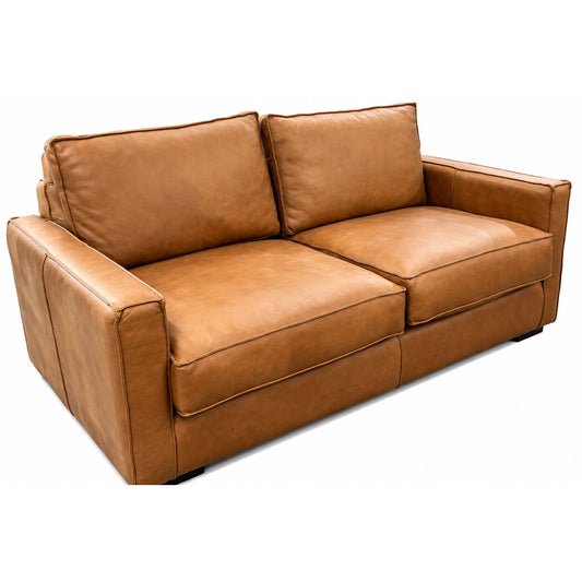 A light brown sofa on a white background