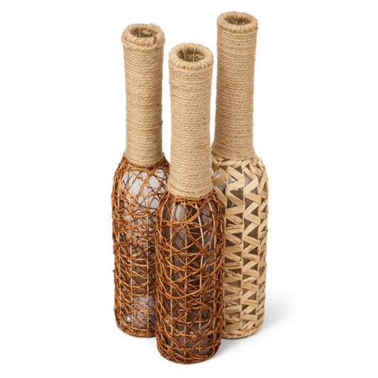 Three small brown vases covered in string like fabric on a white background